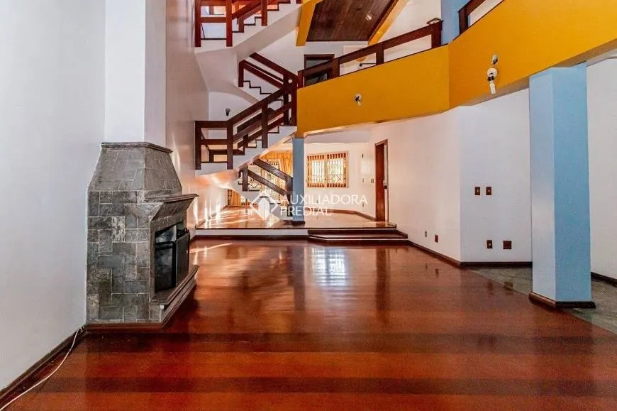 Foto 1 de Casa com 4 Quartos à venda, 431m² em Jardim Planalto, Porto Alegre