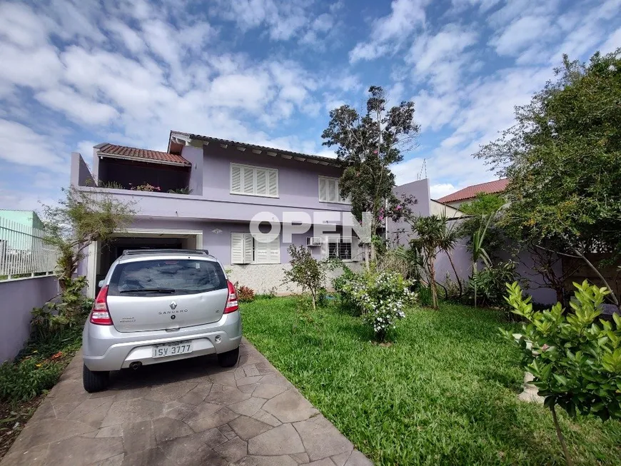 Foto 1 de Sobrado com 4 Quartos à venda, 330m² em Mathias Velho, Canoas