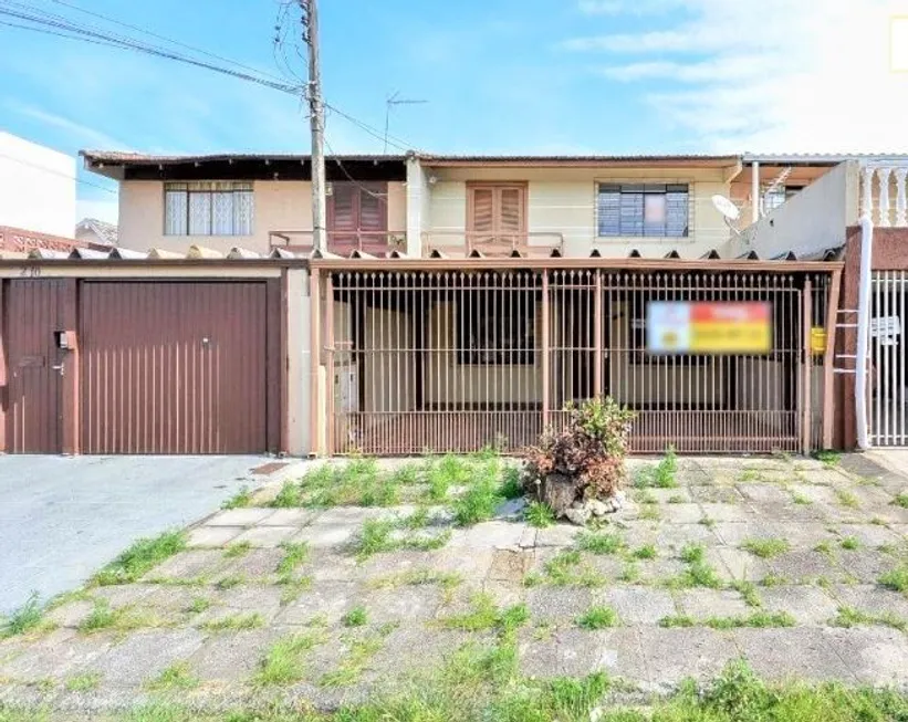 Foto 1 de Sobrado com 3 Quartos à venda, 127m² em Uberaba, Curitiba