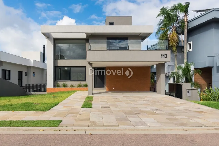 Foto 1 de Casa de Condomínio com 4 Quartos à venda, 350m² em Alphaville, Porto Alegre