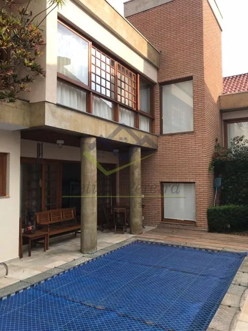 Foto 1 de Casa de Condomínio com 4 Quartos à venda, 310m² em Alphaville, Santana de Parnaíba