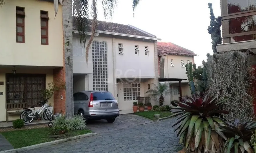 Foto 1 de Casa de Condomínio com 3 Quartos à venda, 349m² em Jardim Isabel, Porto Alegre