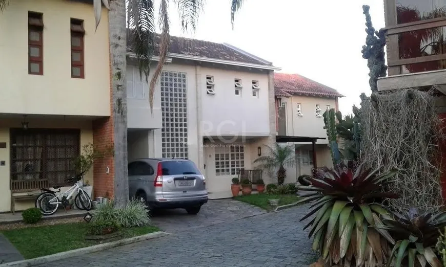 Foto 1 de Casa de Condomínio com 3 Quartos à venda, 351m² em Jardim Isabel, Porto Alegre