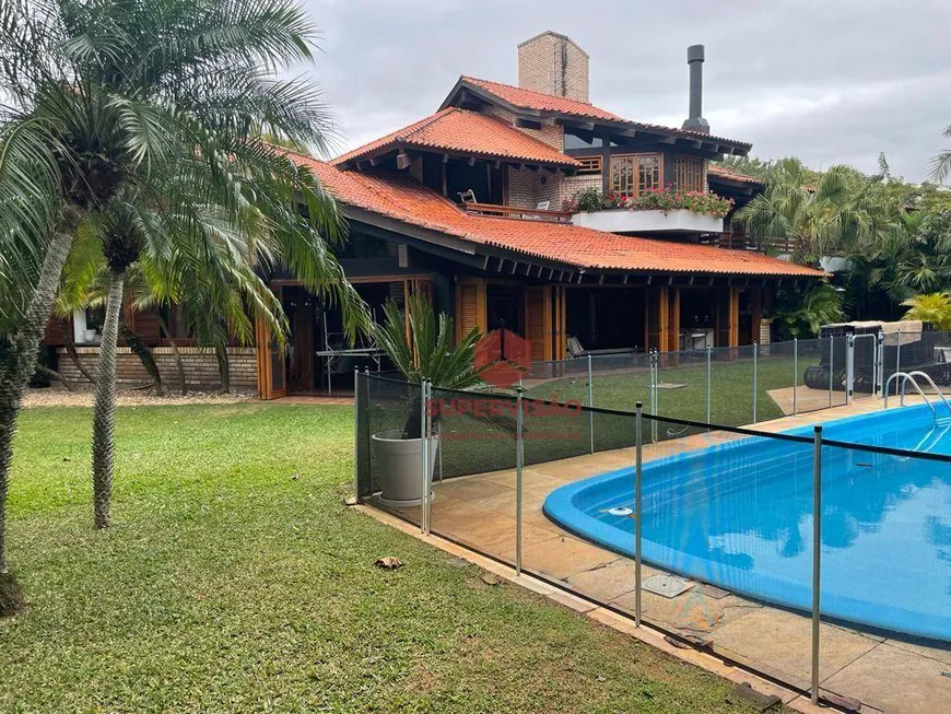 Foto 1 de Casa com 5 Quartos à venda, 622m² em Jurerê Internacional, Florianópolis