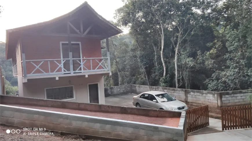 Foto 1 de Casa de Condomínio com 4 Quartos à venda, 280m² em Serra da Cantareira, Mairiporã