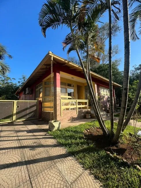 Foto 1 de Casa de Condomínio com 4 Quartos à venda, 169m² em Elsa, Viamão