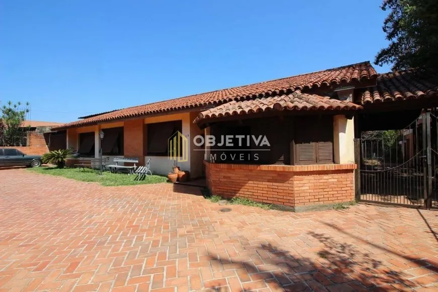 Foto 1 de Casa de Condomínio com 5 Quartos para venda ou aluguel, 611m² em Vila Assunção, Porto Alegre