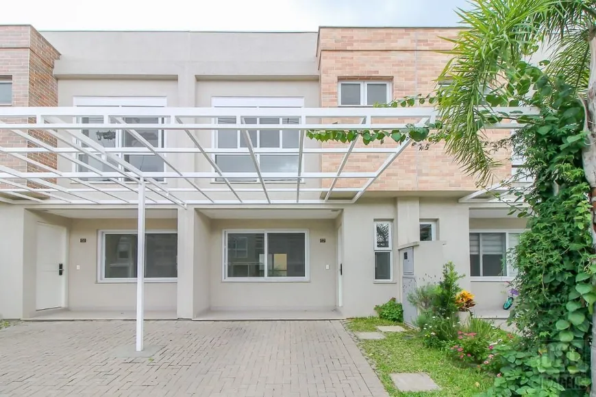 Foto 1 de Casa com 3 Quartos à venda, 119m² em Vila Nova, Porto Alegre