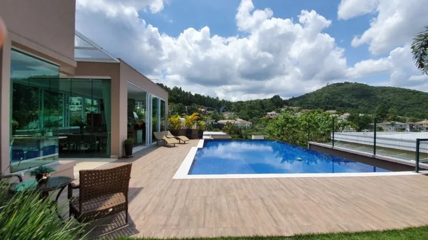 Foto 1 de Casa de Condomínio com 5 Quartos para venda ou aluguel, 740m² em Alphaville, Santana de Parnaíba