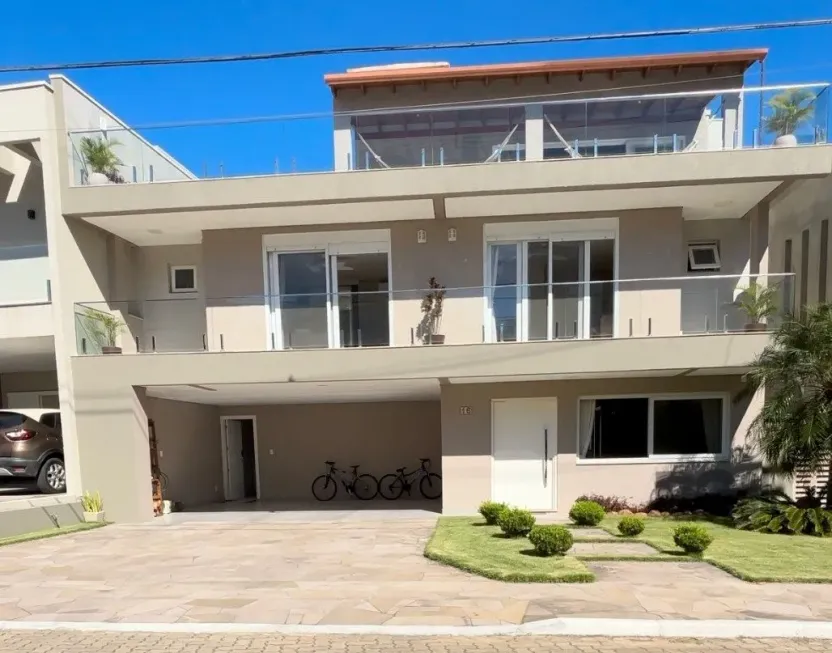 Foto 1 de Casa de Condomínio com 4 Quartos à venda, 311m² em Hípica, Porto Alegre