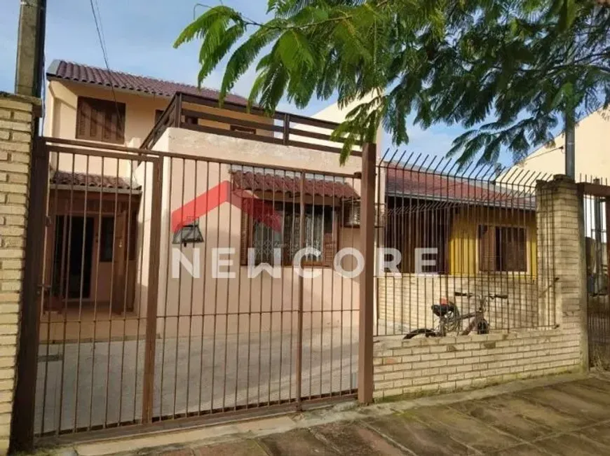 Foto 1 de Casa com 3 Quartos à venda, 130m² em Vila Nova, Porto Alegre