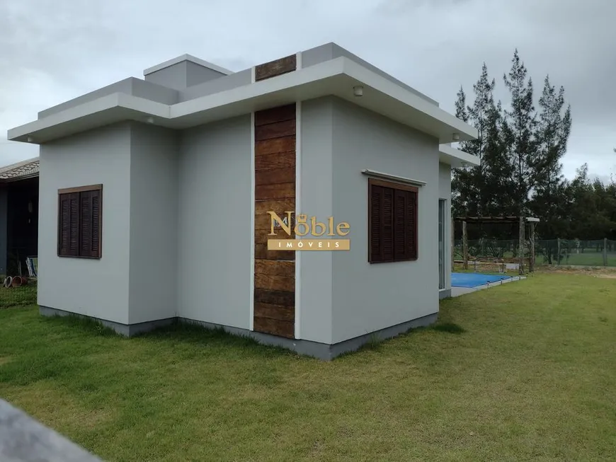 Foto 1 de Casa com 2 Quartos à venda, 67m² em Paraíso, Torres