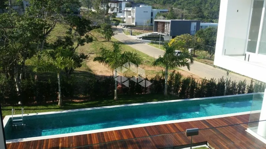 Foto 1 de Casa de Condomínio com 4 Quartos à venda, 489m² em Cacupé, Florianópolis