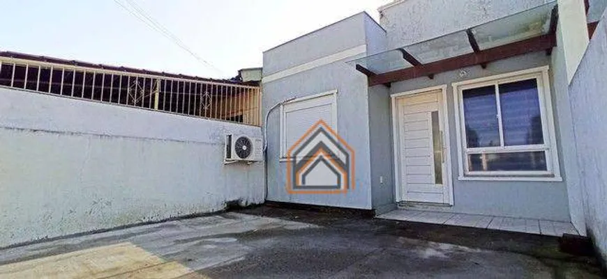 Foto 1 de Casa com 2 Quartos à venda, 54m² em Formoza, Alvorada