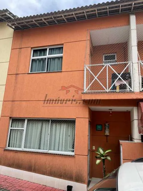 Foto 1 de Casa de Condomínio com 2 Quartos à venda, 71m² em Praça Seca, Rio de Janeiro