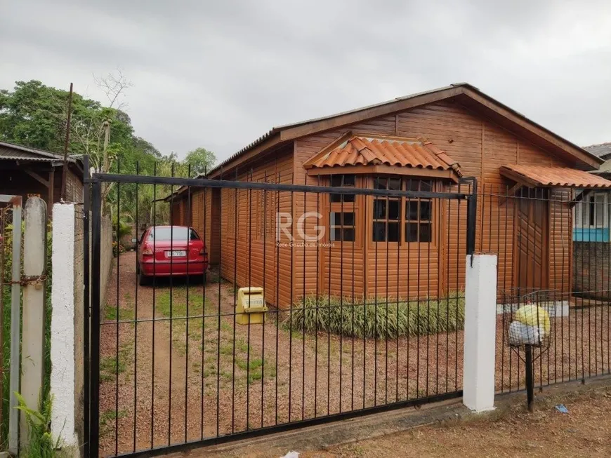 Foto 1 de Casa com 2 Quartos à venda, 42m² em Vila Nova, Porto Alegre