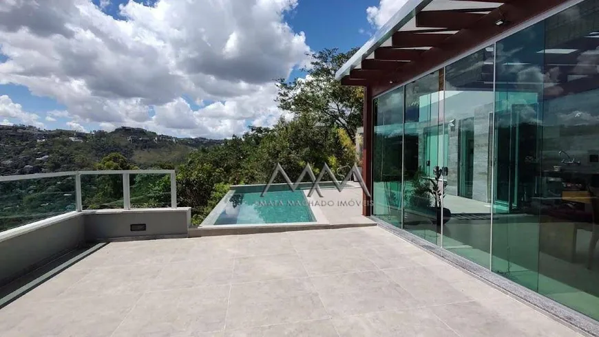 Foto 1 de Casa de Condomínio com 4 Quartos à venda, 550m² em Vila  Alpina, Nova Lima