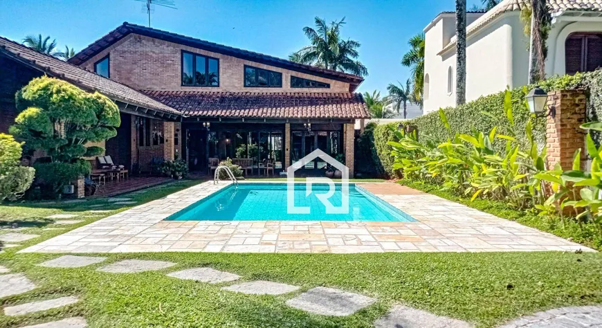 Foto 1 de Casa de Condomínio com 4 Quartos à venda, 390m² em Jardim Acapulco , Guarujá