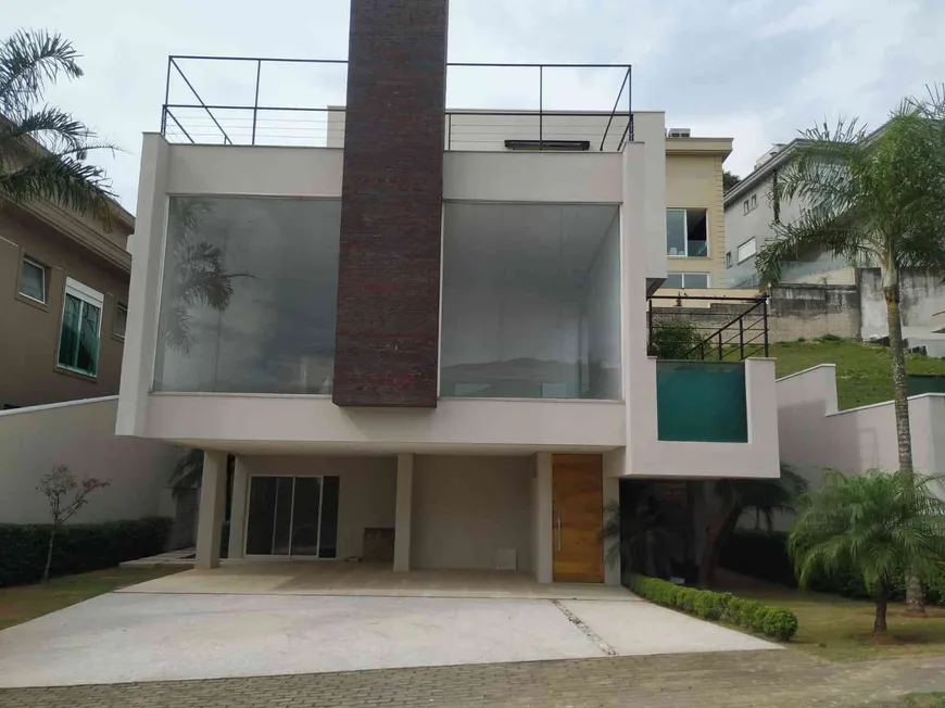 Foto 1 de Casa de Condomínio com 4 Quartos para venda ou aluguel, 575m² em Alphaville, Santana de Parnaíba