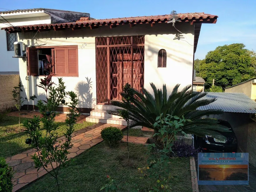 Foto 1 de Casa com 4 Quartos à venda, 100m² em Vila Nova, Porto Alegre
