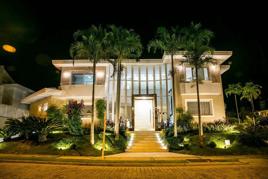 Foto 1 de Casa com 4 Quartos para venda ou aluguel, 500m² em Jurerê, Florianópolis
