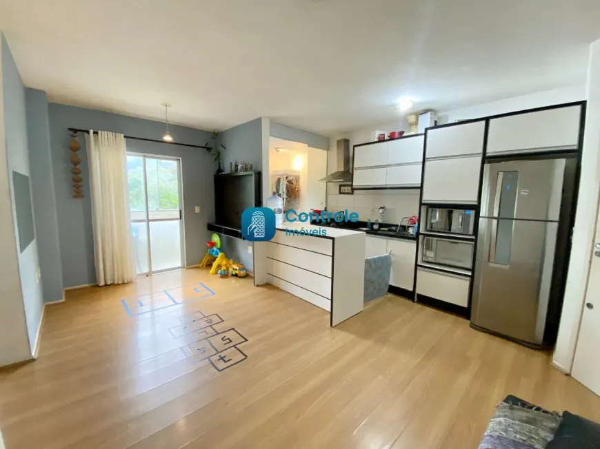 Foto 1 de Apartamento com 2 Quartos à venda, 57m² em Ponta de Baixo, São José