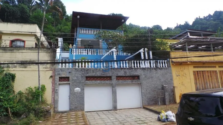 Foto 1 de Casa com 4 Quartos à venda, 259m² em Tanque, Rio de Janeiro