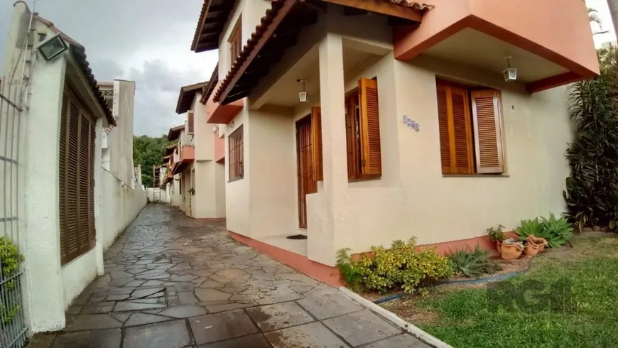 Foto 1 de Casa de Condomínio com 2 Quartos à venda, 61m² em Camaquã, Porto Alegre