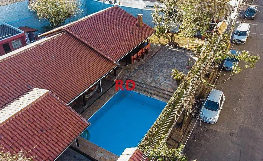 Foto 1 de Casa com 5 Quartos para venda ou aluguel, 400m² em Vila Horizonte, Mogi das Cruzes