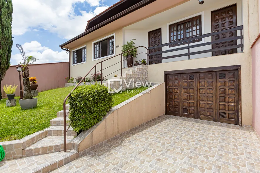 Foto 1 de Casa com 3 Quartos à venda, 230m² em Bacacheri, Curitiba