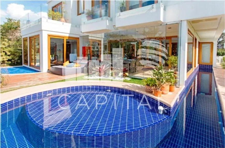 Foto 1 de Casa de Condomínio com 5 Quartos para venda ou aluguel, 504m² em Alphaville, Santana de Parnaíba