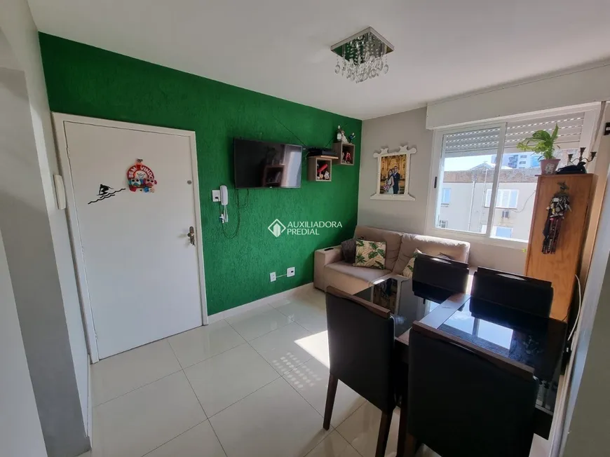 Foto 1 de Apartamento com 2 Quartos à venda, 49m² em Santo Antônio, Porto Alegre