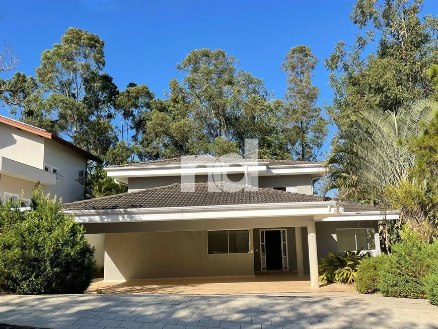 Foto 1 de Casa com 4 Quartos para venda ou aluguel, 425m² em Loteamento Alphaville Campinas, Campinas