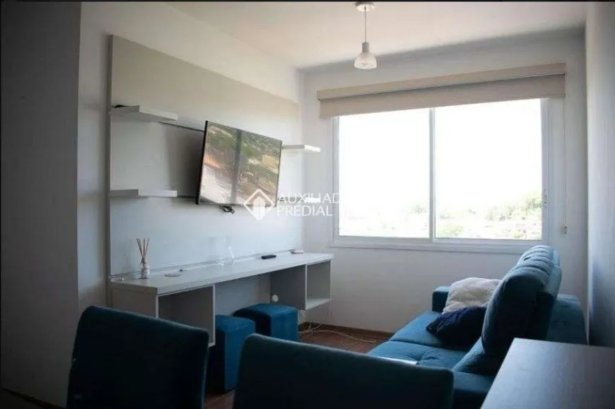 Foto 1 de Apartamento com 2 Quartos à venda, 53m² em Santo Antônio, Porto Alegre