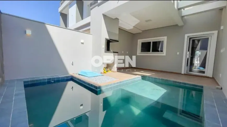 Foto 1 de Sobrado com 3 Quartos à venda, 125m² em Loteamento Moinhos de Vento, Canoas