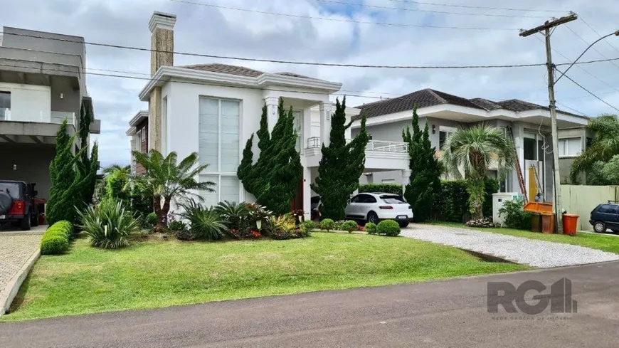 Foto 1 de Casa de Condomínio com 4 Quartos à venda, 411m² em Atlantida, Xangri-lá