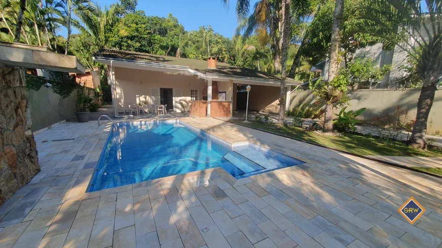 Foto 1 de Casa com 4 Quartos para alugar, 170m² em Riviera de São Lourenço, Bertioga