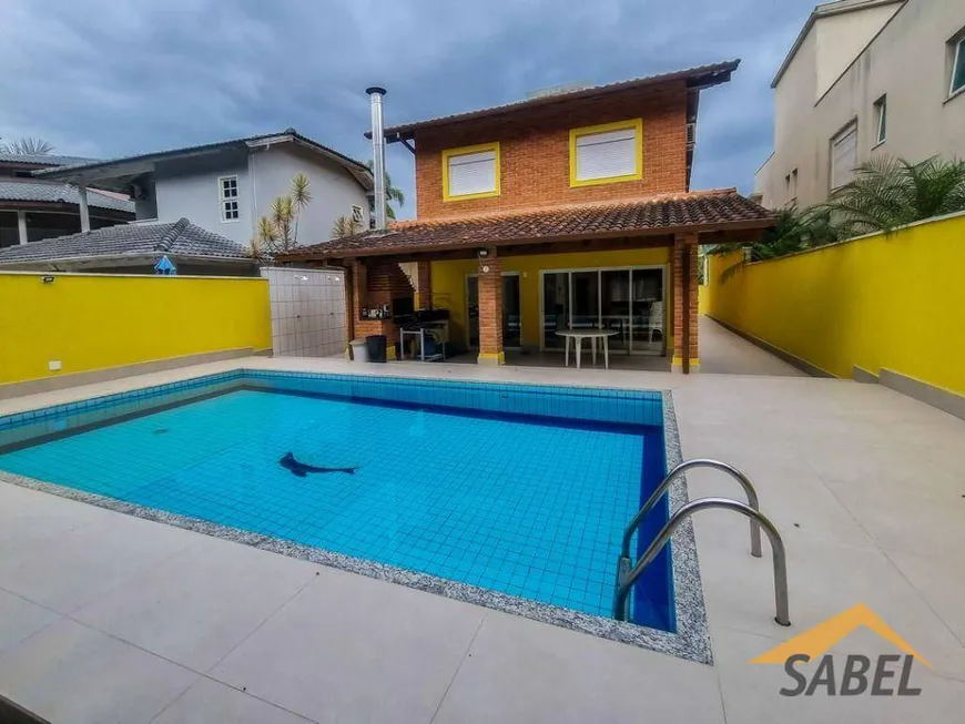 Foto 1 de Casa de Condomínio com 6 Quartos à venda, 209m² em Riviera de São Lourenço, Bertioga