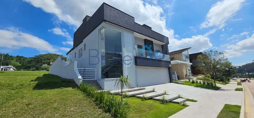 Foto 1 de Casa de Condomínio com 4 Quartos à venda, 330m² em Vila Nova, Porto Alegre