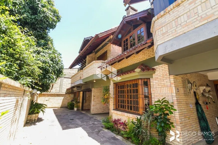 Foto 1 de Casa de Condomínio com 4 Quartos à venda, 199m² em Jardim Isabel, Porto Alegre