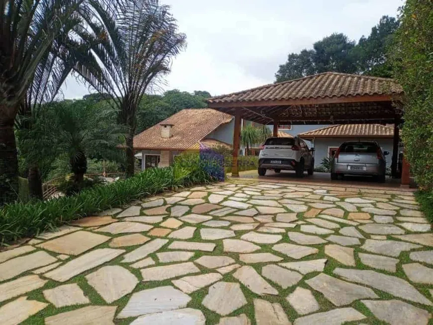 Foto 1 de Casa de Condomínio com 4 Quartos à venda, 470m² em Cumbari, Mairiporã