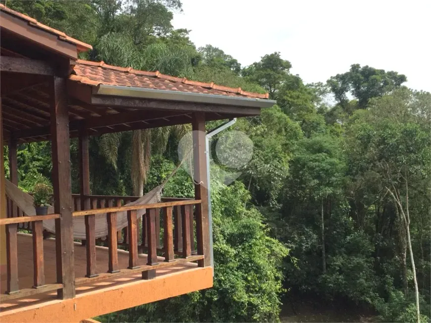 Foto 1 de Casa de Condomínio com 4 Quartos à venda, 198m² em Serra da Cantareira, Mairiporã