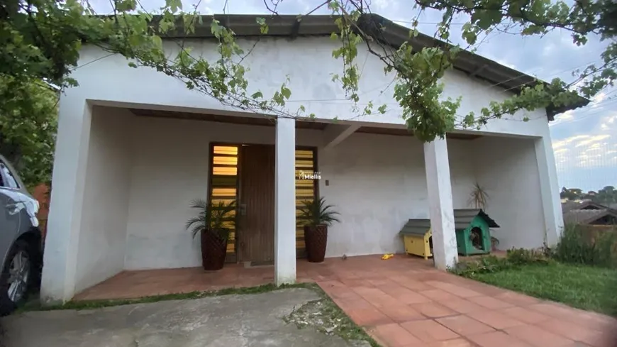 Foto 1 de Casa com 4 Quartos à venda, 100m² em Tarumã, Viamão