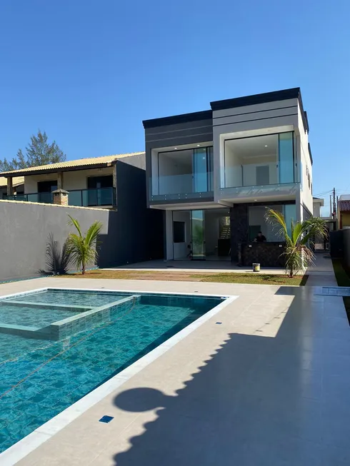 Foto 1 de Casa de Condomínio com 4 Quartos à venda, 250m² em Jardim Guacira, Itanhaém
