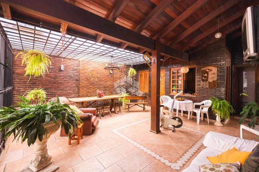 Foto 1 de Casa com 5 Quartos à venda, 324m² em Tristeza, Porto Alegre