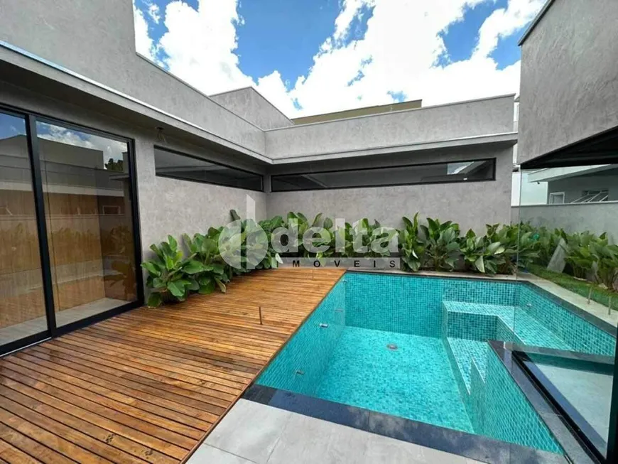 Foto 1 de Casa de Condomínio com 4 Quartos à venda, 240m² em Nova Uberlandia, Uberlândia