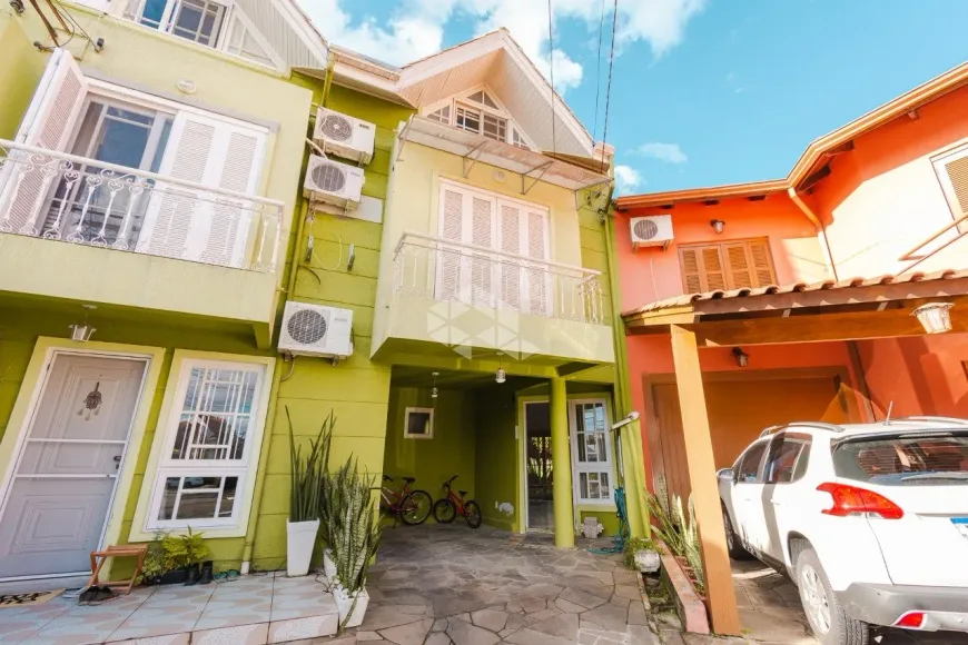 Foto 1 de Casa de Condomínio com 3 Quartos à venda, 200m² em Cavalhada, Porto Alegre