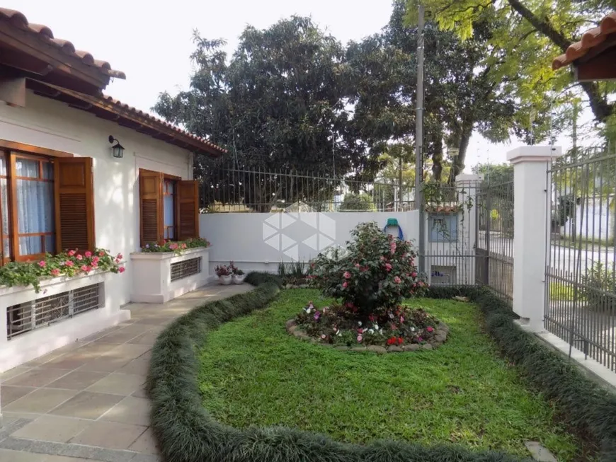 Foto 1 de Casa com 4 Quartos à venda, 240m² em Tristeza, Porto Alegre