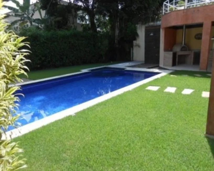 Foto 1 de Casa com 3 Quartos à venda, 210m² em Barra da Tijuca, Rio de Janeiro