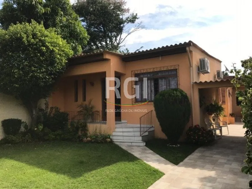 Foto 1 de Casa com 3 Quartos à venda, 150m² em Vila Nova, Porto Alegre